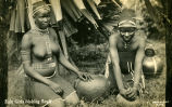 Zulu Girls making Snuff.